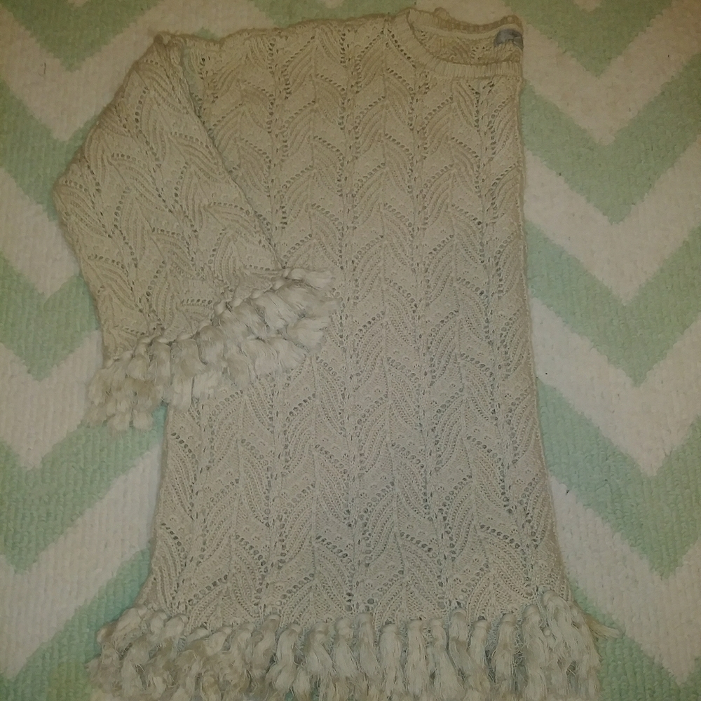 Boxy style knit sweater with fringe